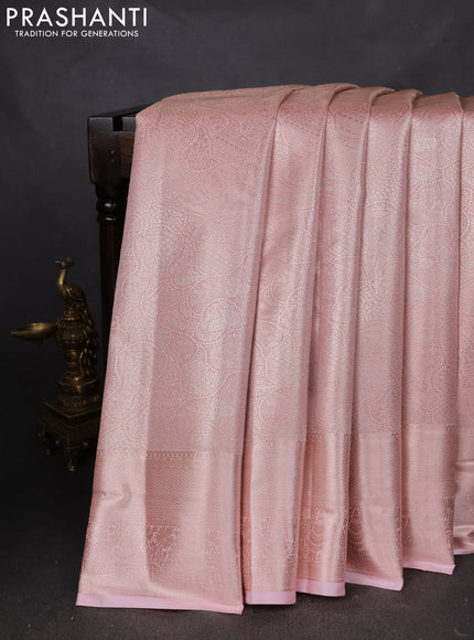 Semi kanchipuram tissue silk saree peach shade with allover silver zari woven brocade weaves and zari woven border