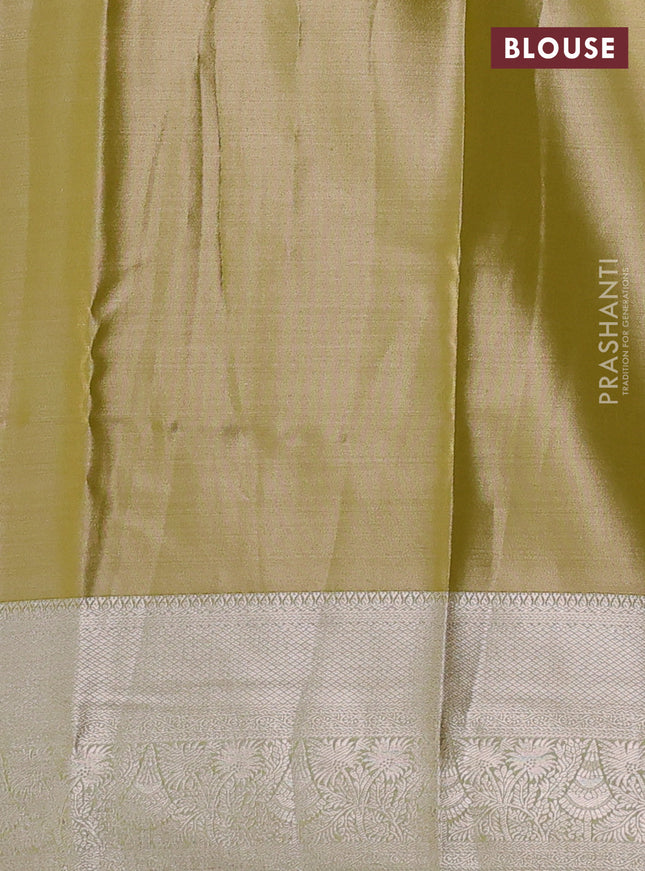 Semi kanchipuram tissue silk saree lime yellow with allover silver zari woven brocade weaves and zari woven border