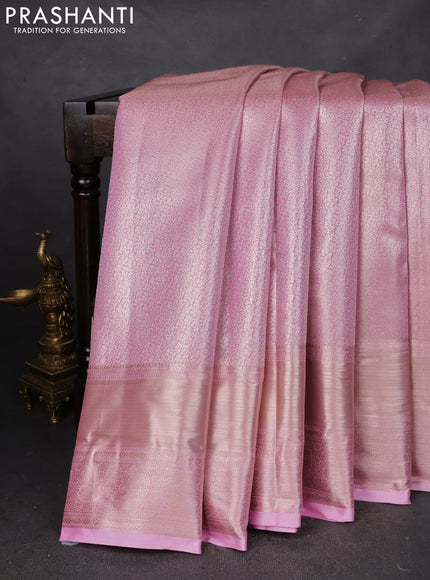 Semi kanchipuram tissue silk saree light pink with allover silver zari woven brocade weaves and long zari woven border