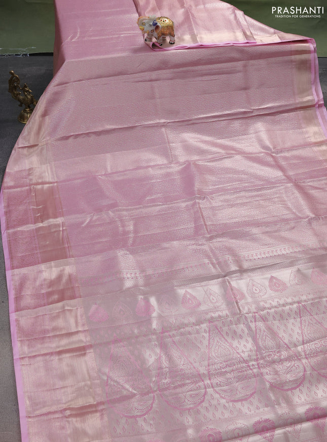 Semi kanchipuram tissue silk saree light pink with allover silver zari woven brocade weaves and long zari woven border