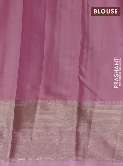 Semi kanchipuram tissue silk saree light pink with allover silver zari woven brocade weaves and long zari woven border