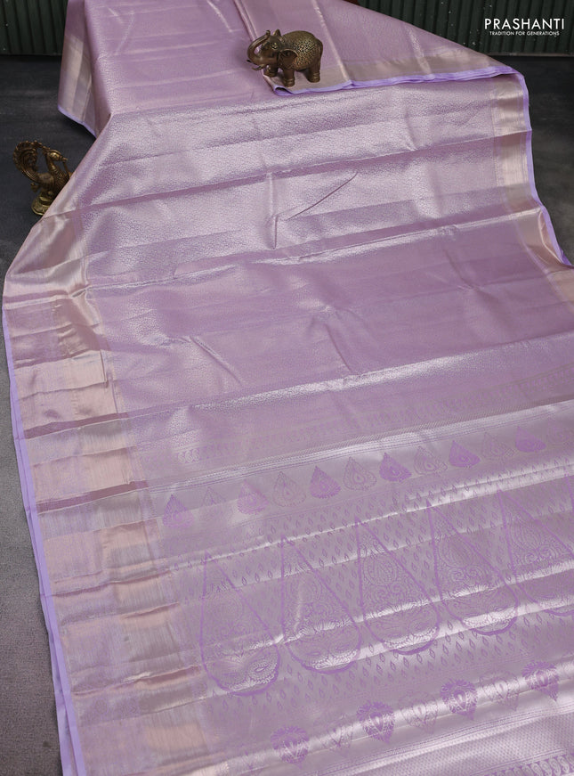 Semi kanchipuram tissue silk saree lavender with allover silver zari woven brocade weaves and long zari woven border