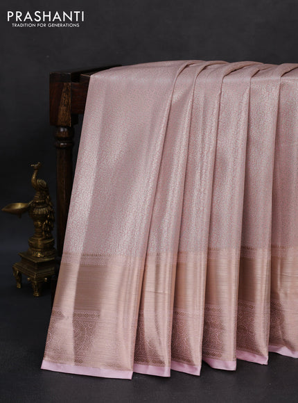 Semi kanchipuram tissue silk saree baby pink with allover silver zari woven brocade weaves and long zari woven border