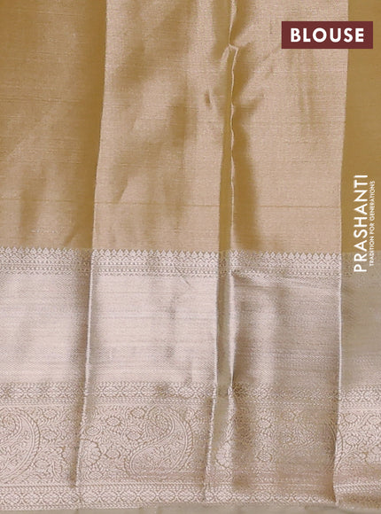 Semi kanchipuram tissue silk saree sandal with allover silver zari woven paisley brocade weaves and long zari woven border
