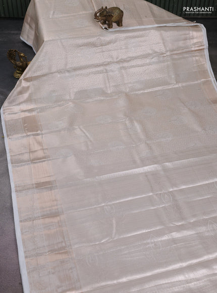 Semi kanchipuram tissue silk saree beige and off white with allover silver zari woven brocade weaves and long zari woven border