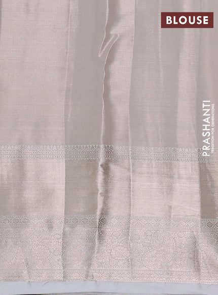 Semi kanchipuram tissue silk saree beige and off white with allover silver zari woven brocade weaves and long zari woven border