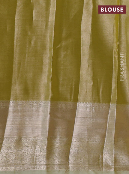 Semi kanchipuram tissue silk saree elaichi green with allover silver zari woven brocade weaves and long zari woven border