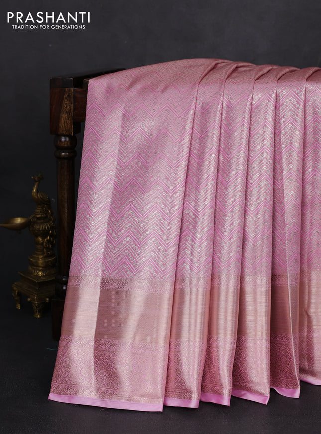 Semi kanchipuram tissue silk saree light pink with allover silver zari woven brocade weaves and long zari woven border