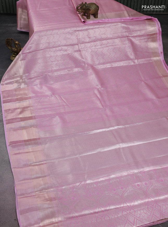 Semi kanchipuram tissue silk saree light pink with allover silver zari woven brocade weaves and long zari woven border