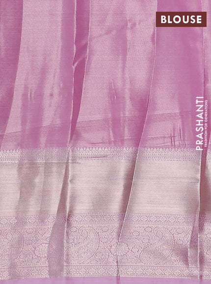 Semi kanchipuram tissue silk saree light pink with allover silver zari woven brocade weaves and long zari woven border