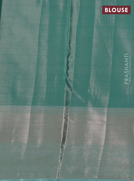 Semi kanchipuram tissue silk saree teal blue with allover silver zari woven brocade weaves and long zari woven border