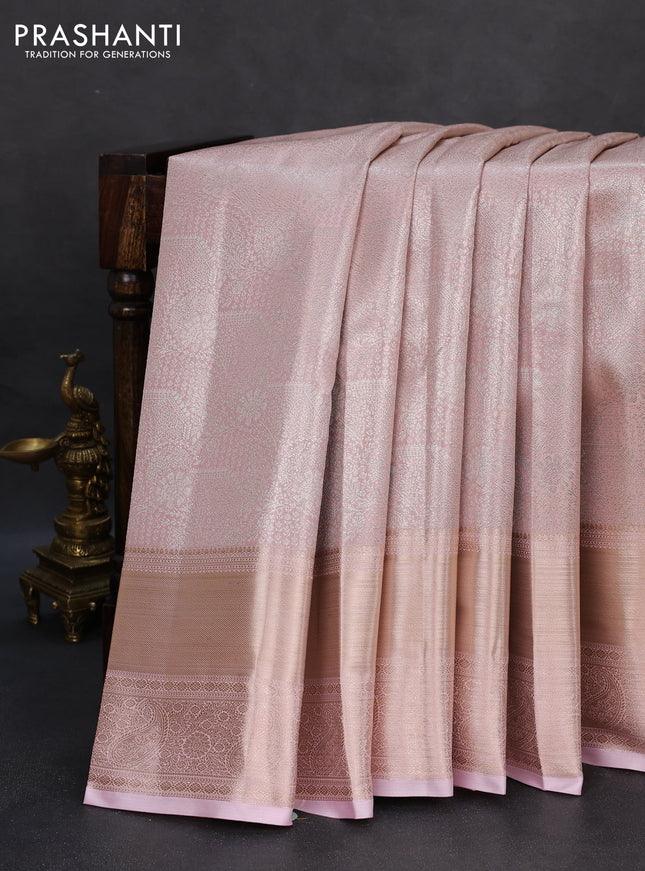 Semi kanchipuram tissue silk saree baby pink with allover silver zari woven brocade weaves and long zari woven border