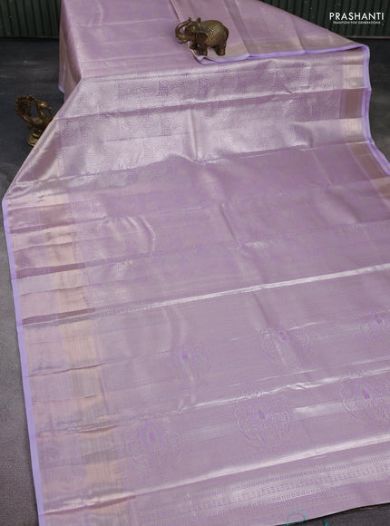 Semi kanchipuram tissue silk saree lavender with allover silver zari woven brocade weaves and long zari woven border