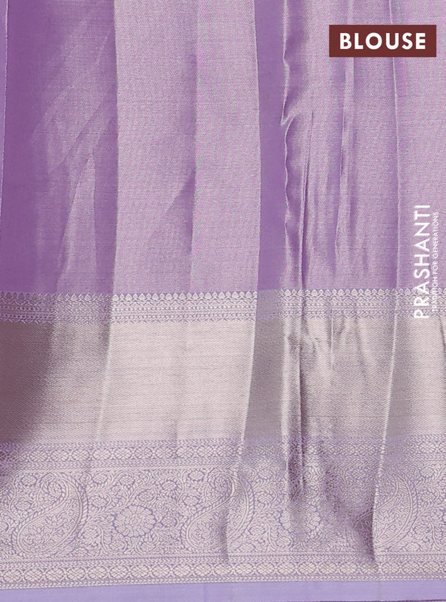 Semi kanchipuram tissue silk saree lavender with allover silver zari woven brocade weaves and long zari woven border