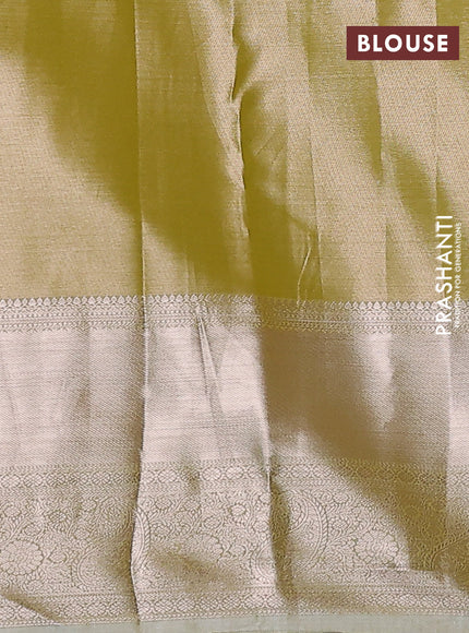 Semi kanchipuram tissue silk saree elaichi green with allover silver zari woven brocade weaves and long zari woven border