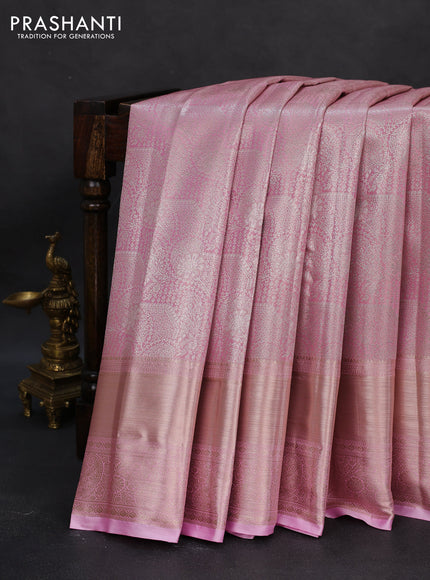 Semi kanchipuram tissue silk saree light pink with allover silver zari woven brocade weaves and long zari woven border