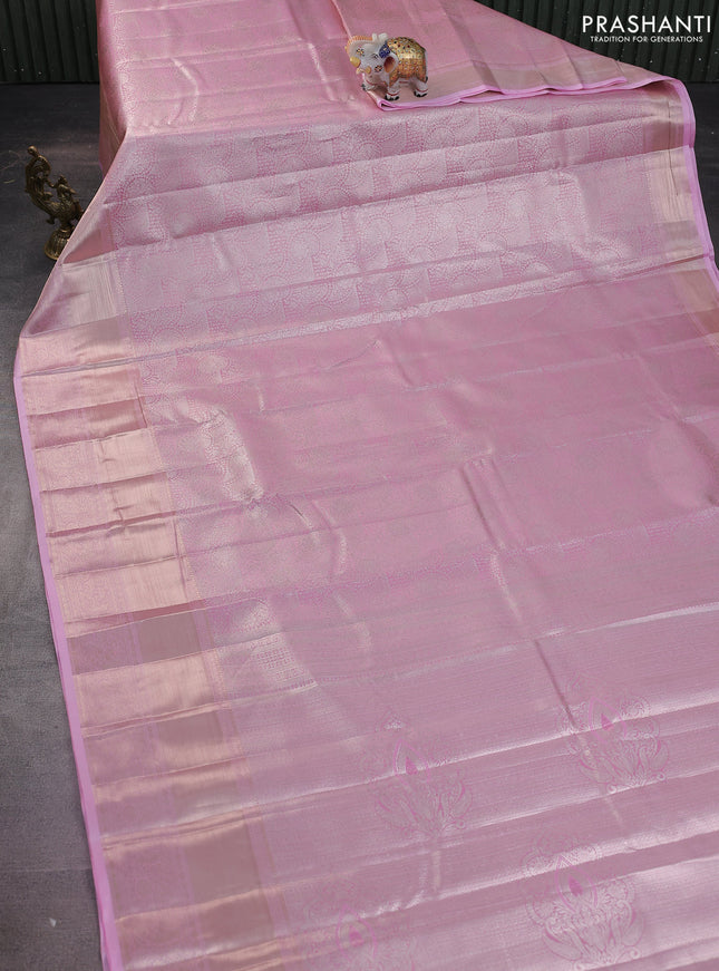 Semi kanchipuram tissue silk saree light pink with allover silver zari woven brocade weaves and long zari woven border