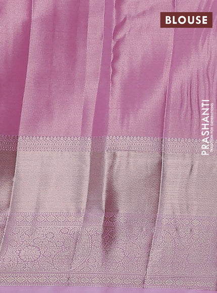 Semi kanchipuram tissue silk saree light pink with allover silver zari woven brocade weaves and long zari woven border