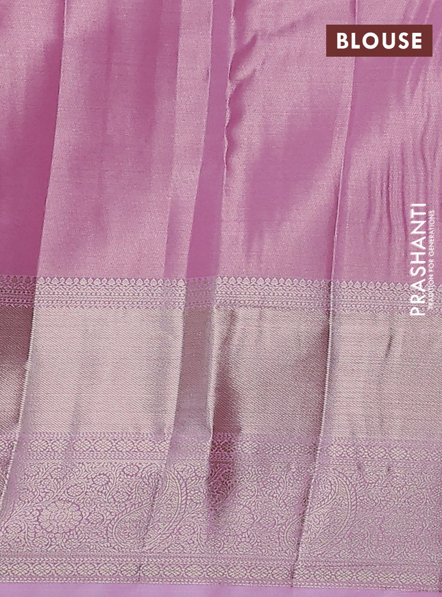 Semi kanchipuram tissue silk saree light pink with allover silver zari woven brocade weaves and long zari woven border