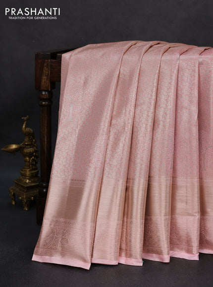 Semi kanchipuram tissue silk saree mild peach with allover silver zari woven brocade weaves and long zari woven border