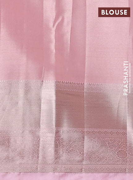 Semi kanchipuram tissue silk saree mild peach with allover silver zari woven brocade weaves and long zari woven border