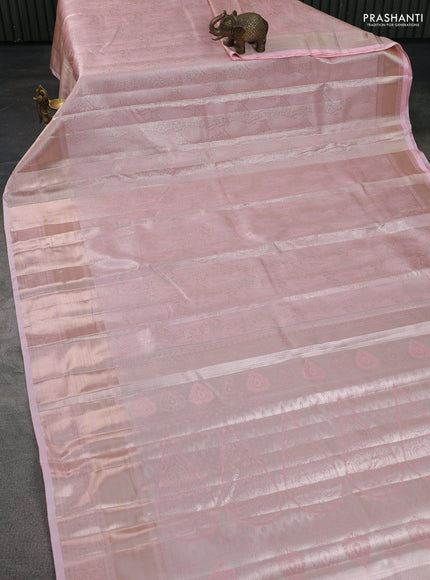 Semi kanchipuram tissue silk saree mild peach with allover silver zari woven brocade weaves and long zari woven border