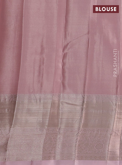 Semi kanchipuram tissue silk saree mild peach with allover silver zari woven brocade weaves and long zari woven border