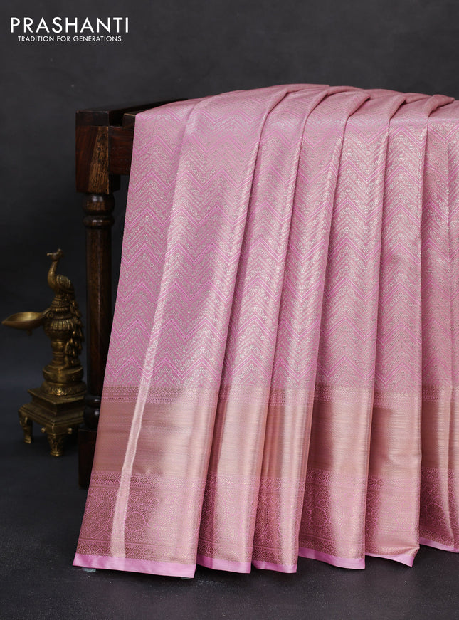 Semi kanchipuram tissue silk saree light pink with allover silver zari woven brocade weaves and long zari woven border