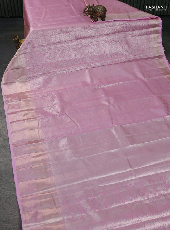 Semi kanchipuram tissue silk saree light pink with allover silver zari woven brocade weaves and long zari woven border