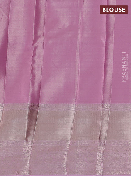 Semi kanchipuram tissue silk saree light pink with allover silver zari woven brocade weaves and long zari woven border