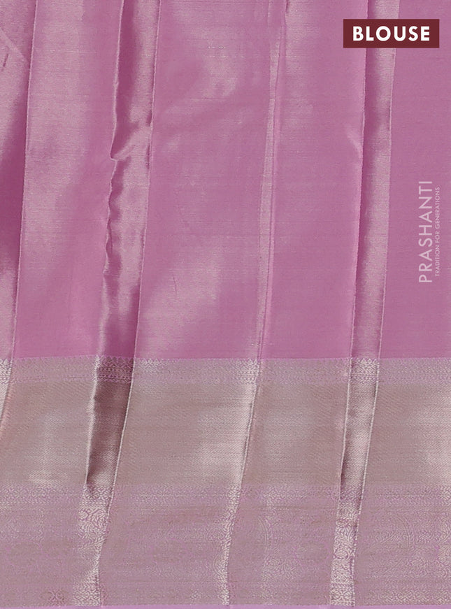 Semi kanchipuram tissue silk saree light pink with allover silver zari woven brocade weaves and long zari woven border