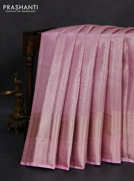 Semi kanchipuram tissue silk saree light pink with allover silver zari woven brocade weaves and long zari woven border