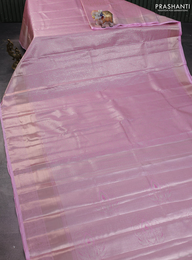 Semi kanchipuram tissue silk saree light pink with allover silver zari woven brocade weaves and long zari woven border