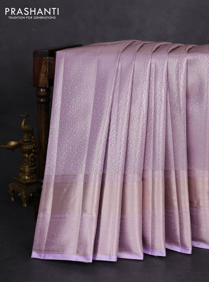 Semi kanchipuram tissue silk saree lavender with allover silver zari woven brocade weaves and long zari woven border