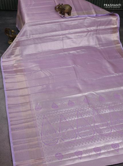 Semi kanchipuram tissue silk saree lavender with allover silver zari woven brocade weaves and long zari woven border