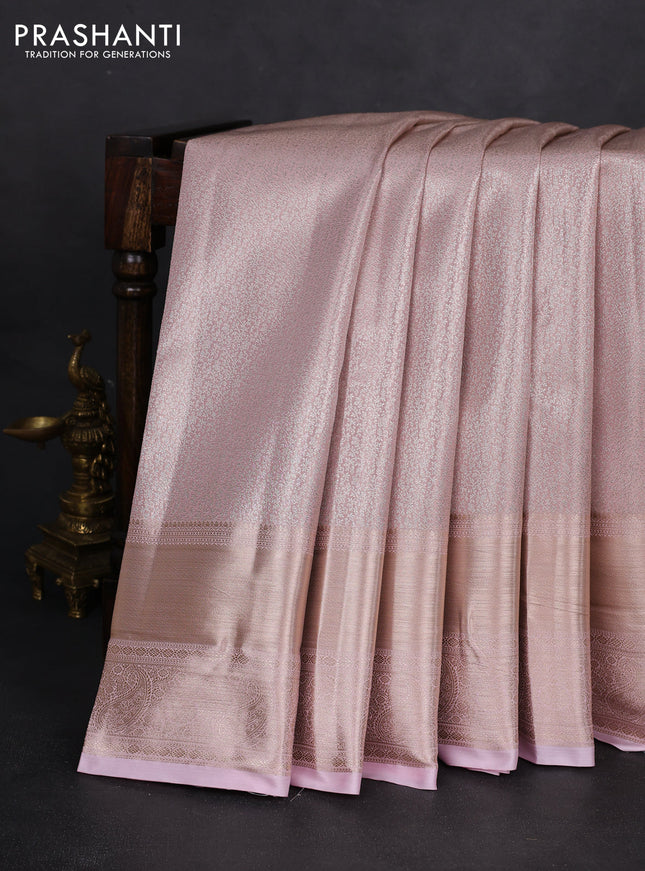 Semi kanchipuram tissue silk saree baby pink with allover silver zari woven brocade weaves and long zari woven border