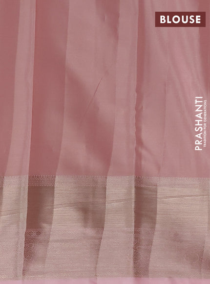 Semi kanchipuram tissue silk saree mild peach with allover silver zari woven brocade weaves and long zari woven border