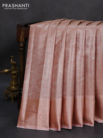 Semi kanchipuram tissue silk saree peach shade with allover silver zari woven brocade weaves and zari woven border