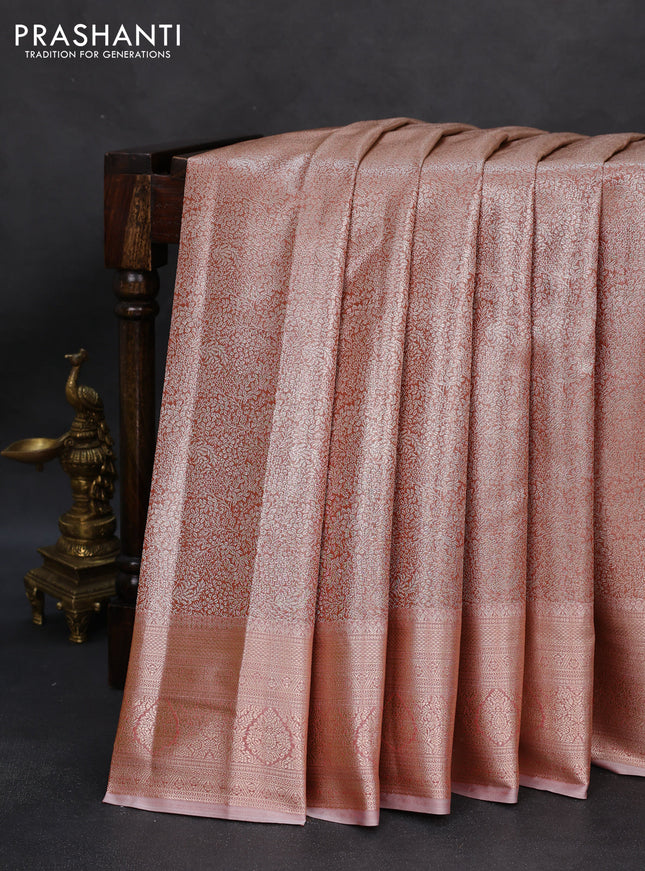 Semi kanchipuram tissue silk saree peach shade with allover silver zari woven brocade weaves and zari woven border