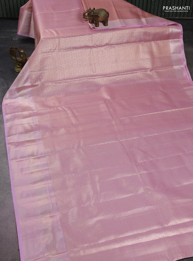 Semi kanchipuram tissue silk saree dual shade of light pink with allover silver zari woven brocade weaves and long zari woven border