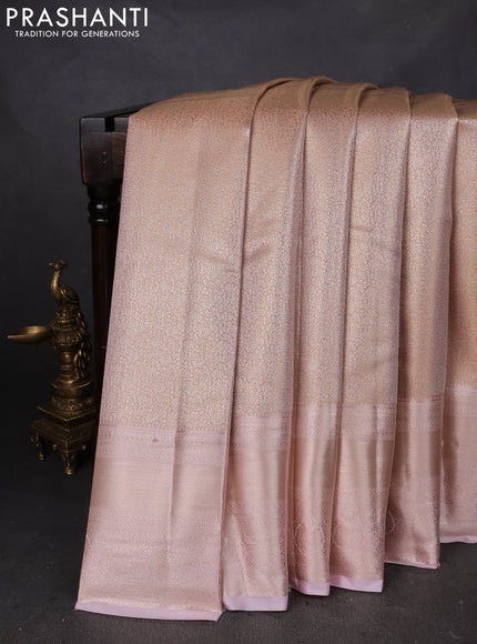 Semi kanchipuram tissue silk saree pastel peach and baby pink with allover silver zari woven brocade weaves and long zari woven border