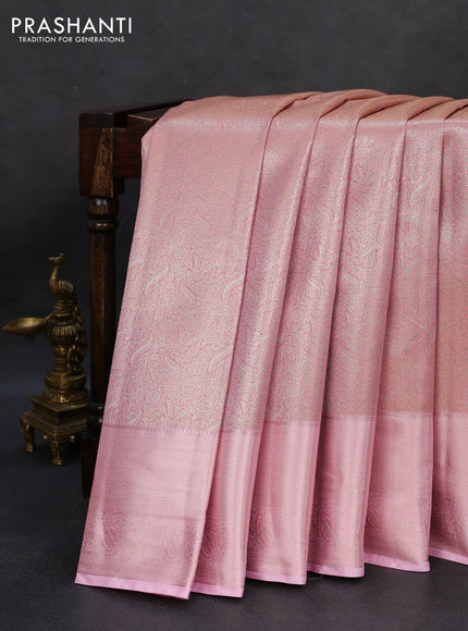 Semi kanchipuram tissue silk saree light pink with allover silver zari woven brocade weaves and long zari woven border