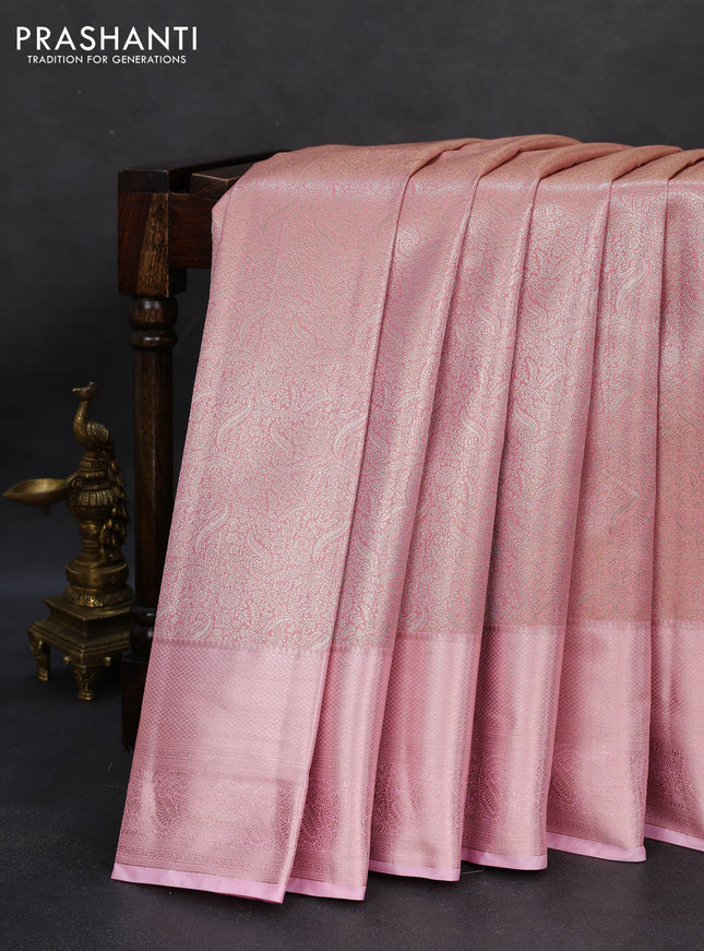 Semi kanchipuram tissue silk saree light pink with allover silver zari woven brocade weaves and long zari woven border