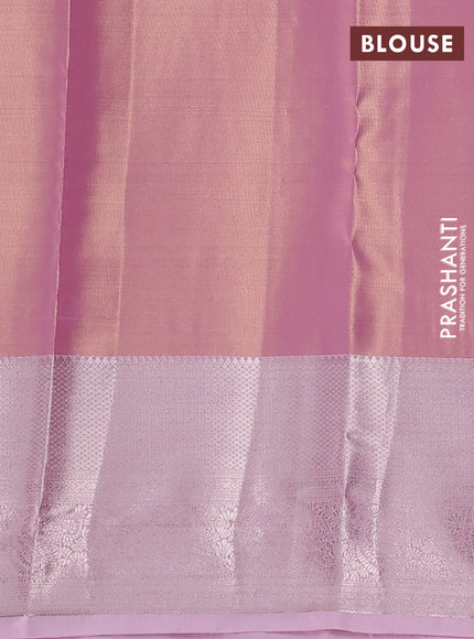 Semi kanchipuram tissue silk saree light pink with allover silver zari woven brocade weaves and long zari woven border