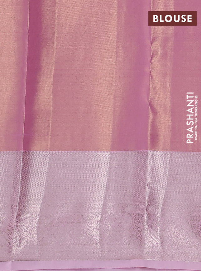Semi kanchipuram tissue silk saree light pink with allover silver zari woven brocade weaves and long zari woven border