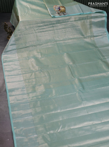Semi kanchipuram tissue silk saree dual shade of teal with allover silver zari woven brocade weaves and zari woven border
