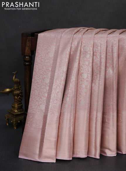 Semi kanchipuram tissue silk saree baby pink with allover silver zari woven brocade weaves and long zari woven border