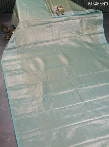 Semi kanchipuram tissue silk saree dual shade of teal with allover silver zari woven brocade weaves and long zari woven border