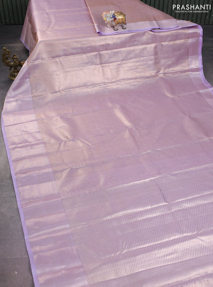 Semi kanchipuram tissue silk saree lavender with allover silver zari woven brocade weaves and long zari woven border