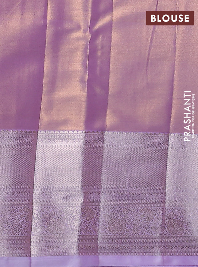 Semi kanchipuram tissue silk saree lavender with allover silver zari woven brocade weaves and long zari woven border